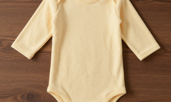 Which is better: the Arista children's bodysuit or a premium two-sided cotton terry bathrobe?